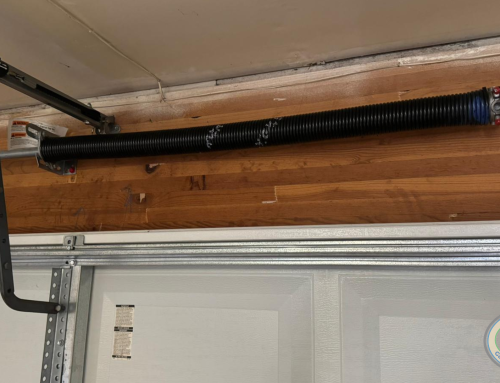 How Cold Weather Breaks Garage Door Torsion Springs: Science and Prevention